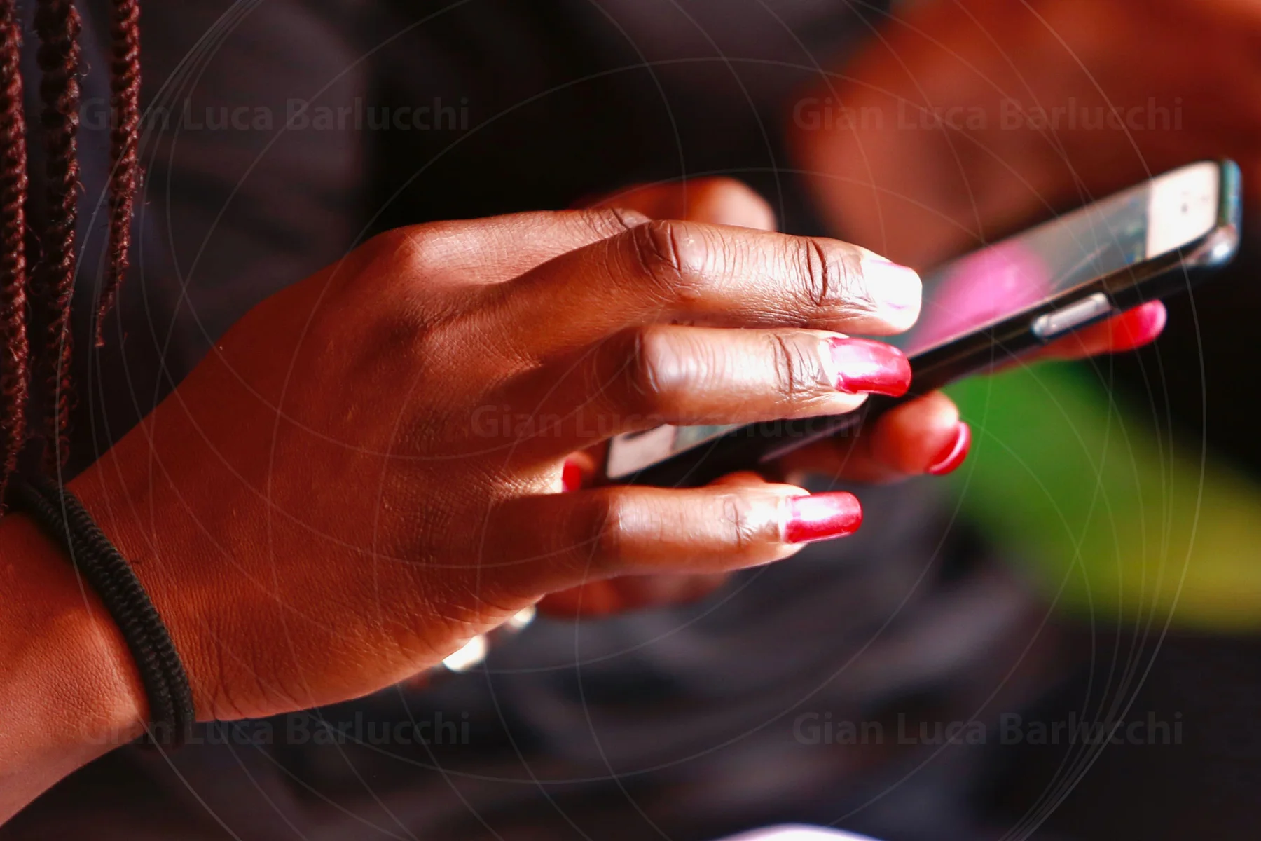 Close-up of hands using a mobile phone